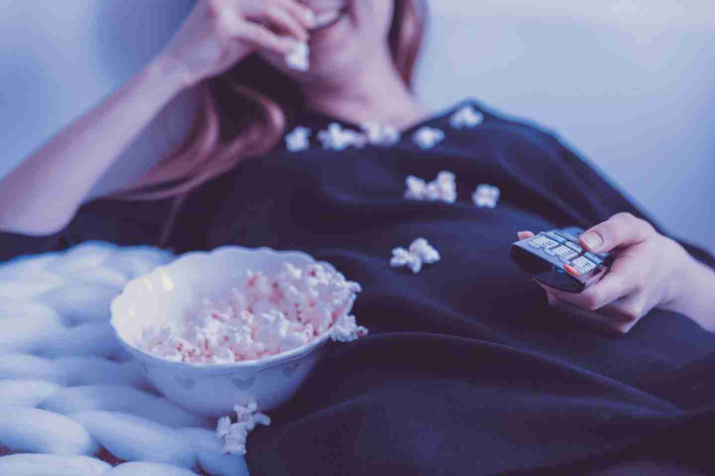 Lesbian movies on netflix and amazon prime, lady with popcorn.