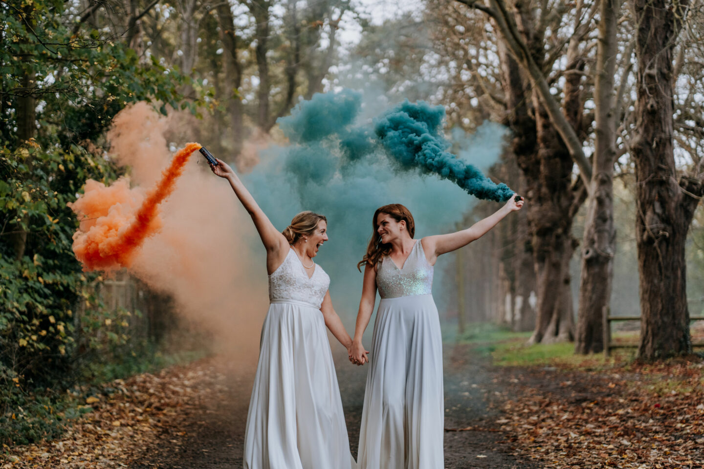 two brides holding hands